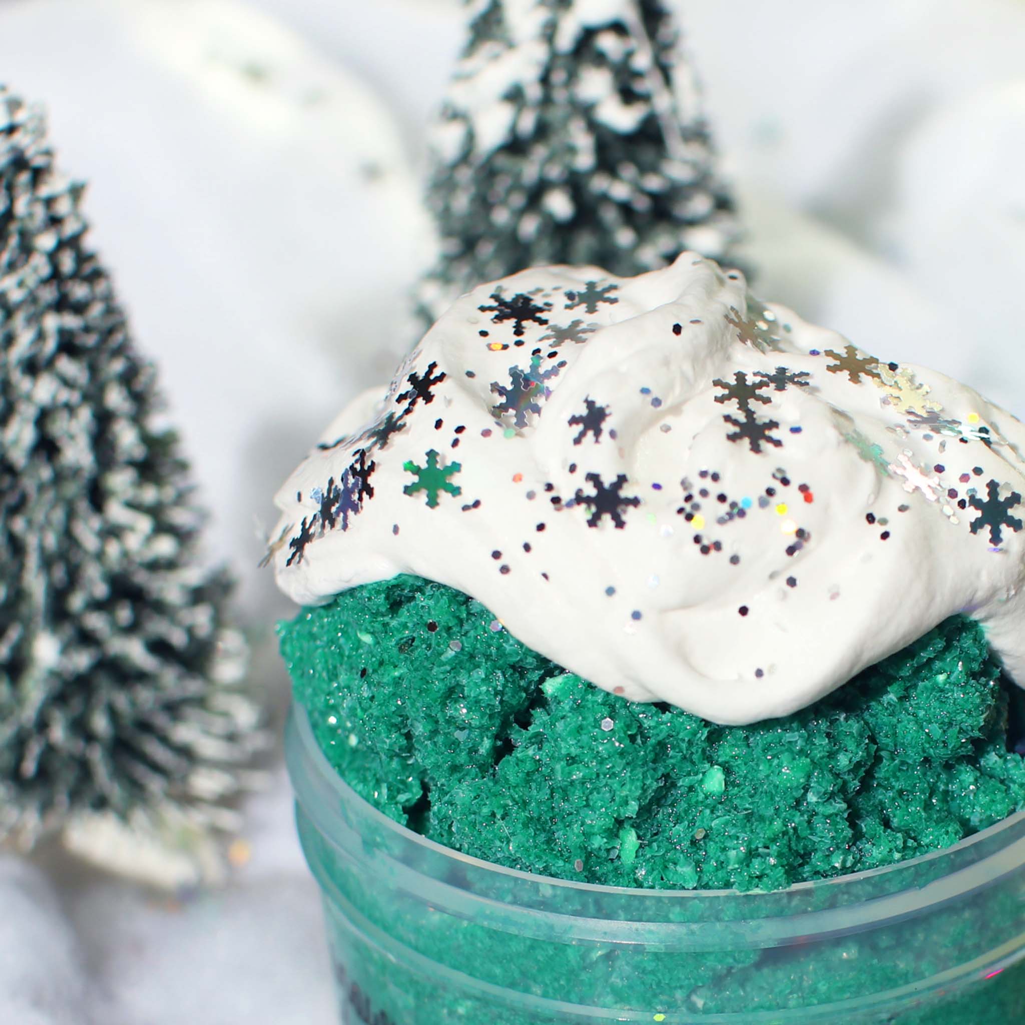 Snowy Christmas Morning Christmas Slime Gift For Kids Green White Tree Scented Clay Creamy Crunchy Butter Snow Fizz Slime Fantasies Shop 9oz Front View Decoration Closeup