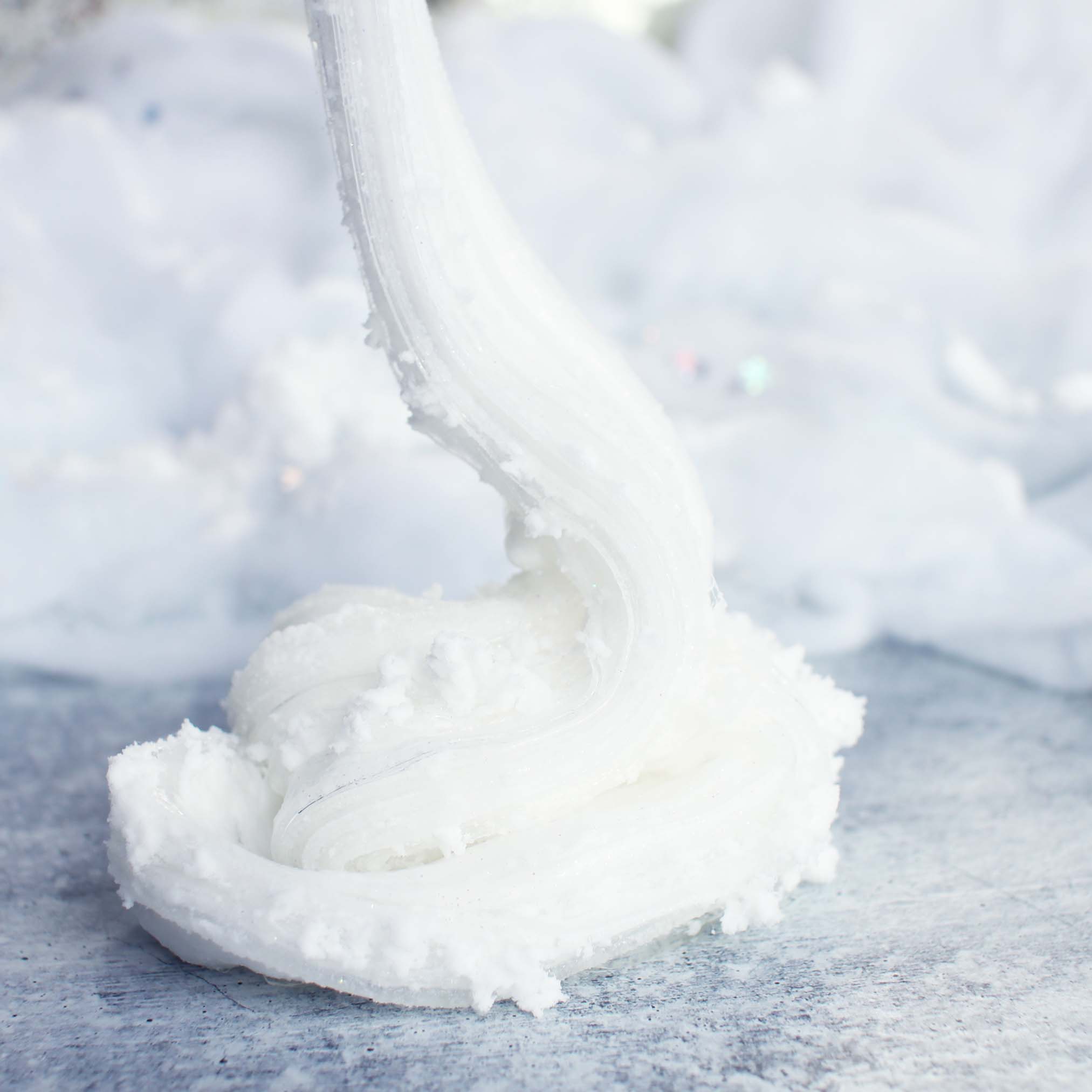 Sparkling Winter Wonderland Christmas Slime Gift For Kids White Peppermint Scented Cloud Clear Slime Fantasies Shop 9oz Front View Decoration Drizzle